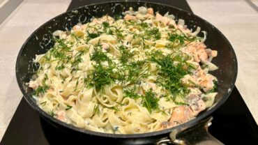 Creamy salmon pasta with fresh dill, tagliatelle, capers and rich sauce