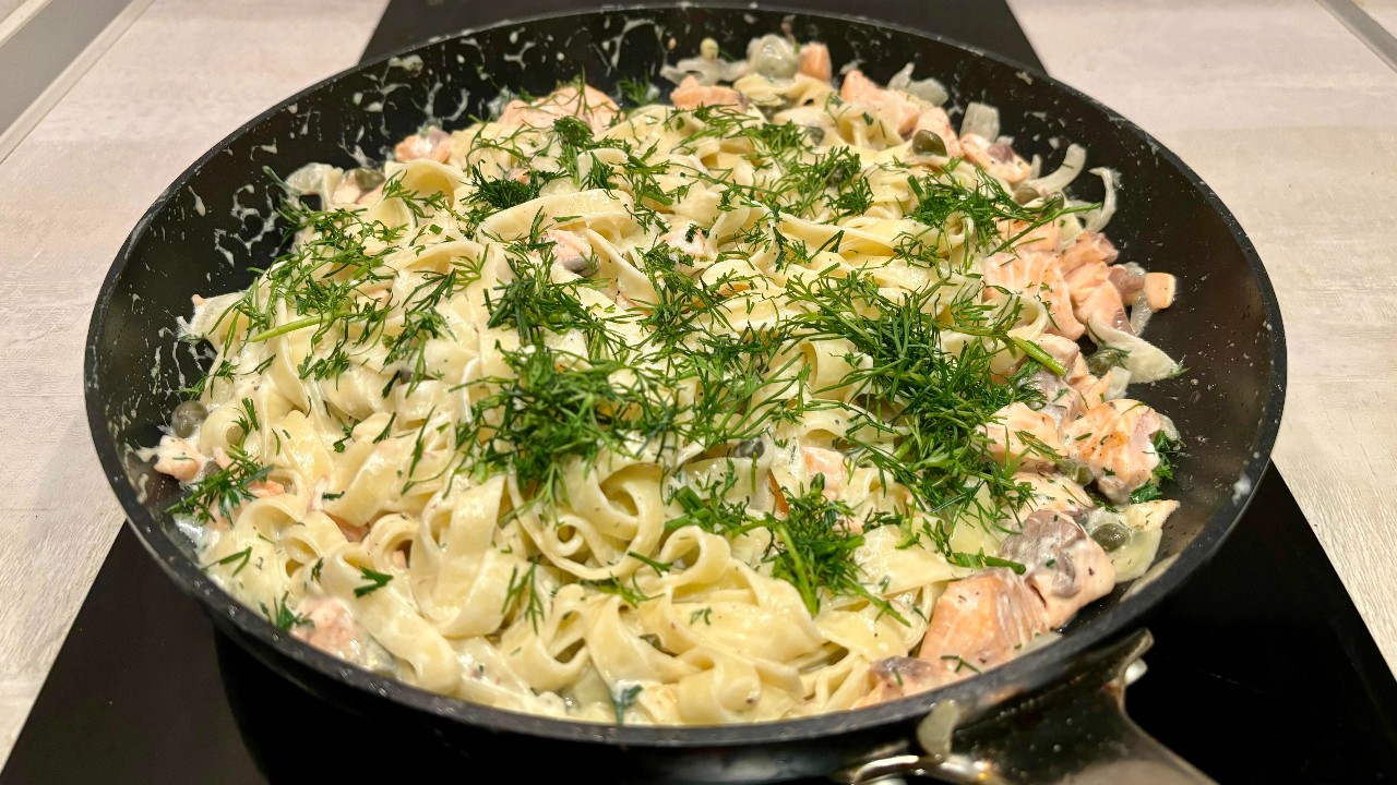 Creamy salmon pasta with fresh dill, tagliatelle, capers and rich sauce